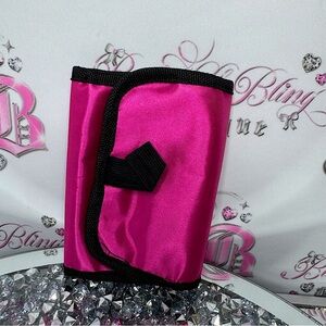 Jewelry holder travelling bag opens up and can hang pink tie dye inside plastic
